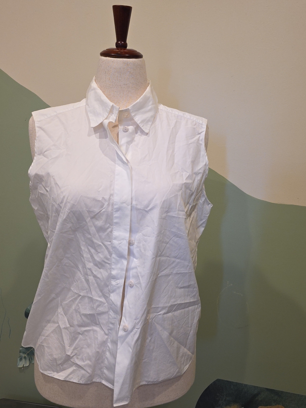 CHANEL Sleeveless White Button-Down Shirt